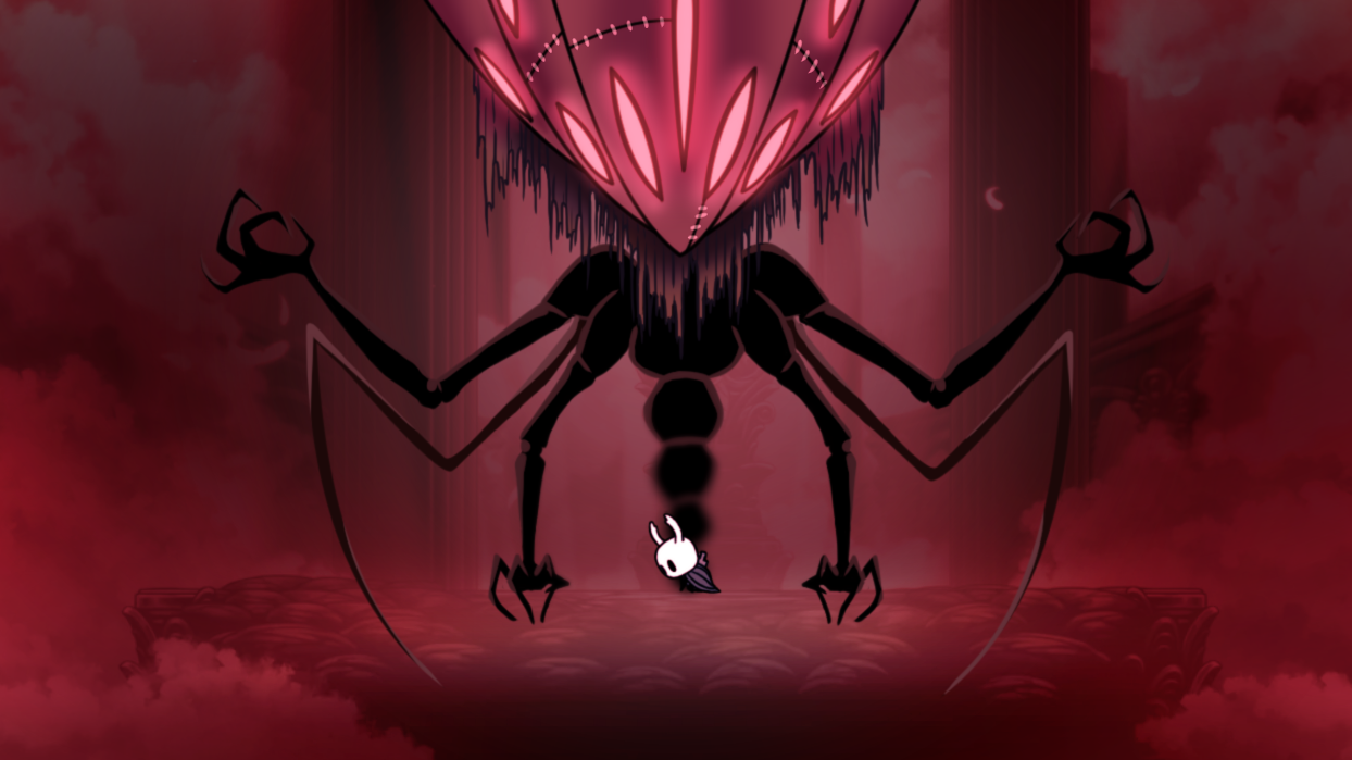 there is a cartoon picture of a creepy spider with a red light