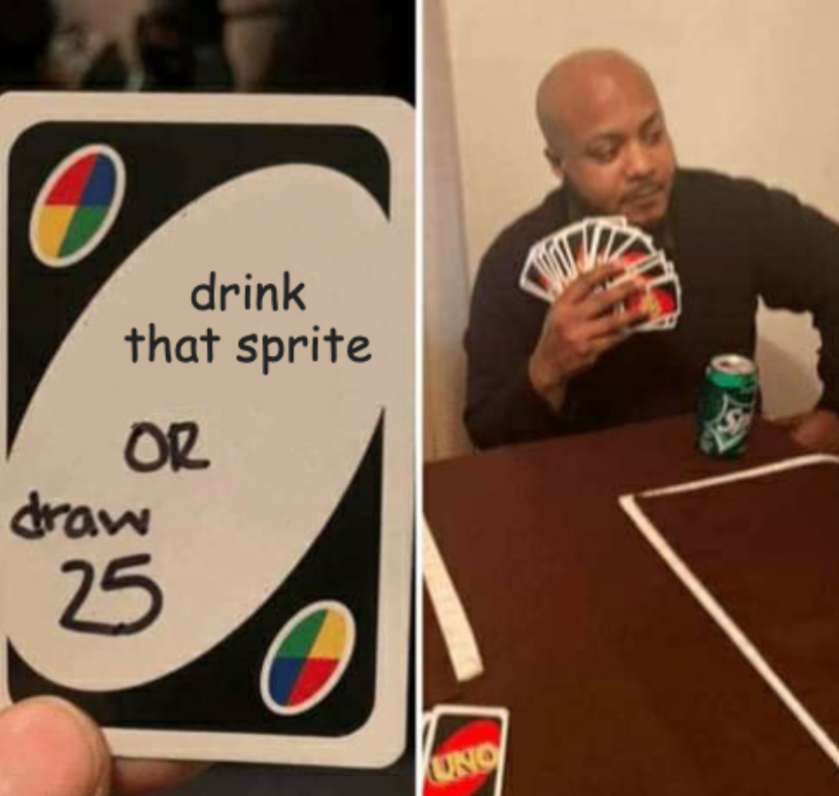 man holding a drink and playing a card game