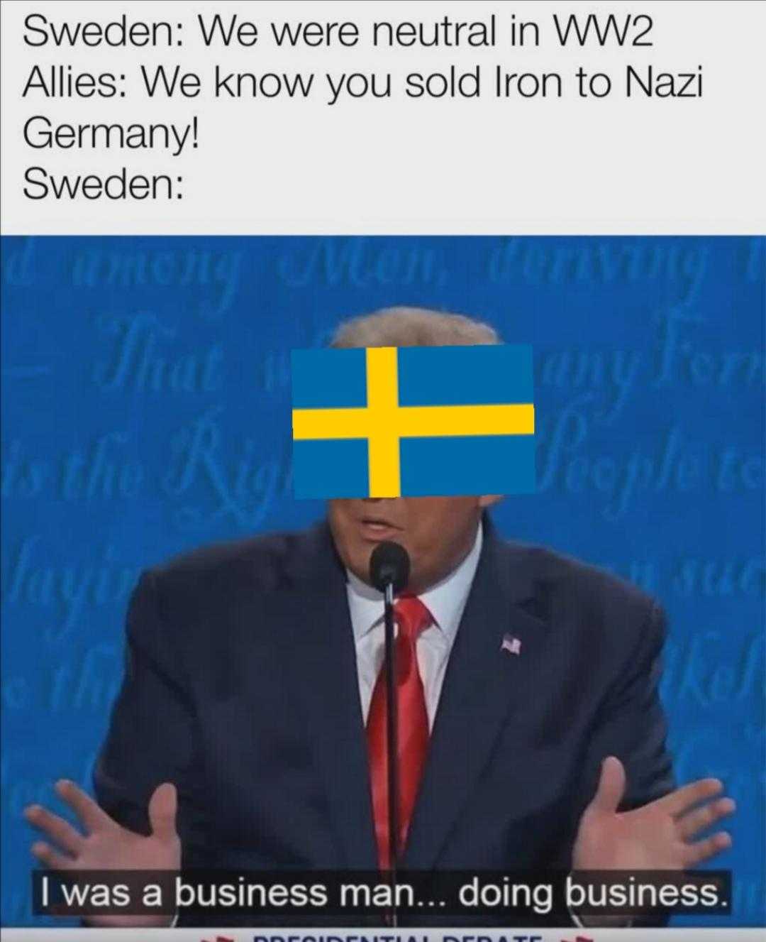 a close up of a person in a suit and tie with a flag on his head