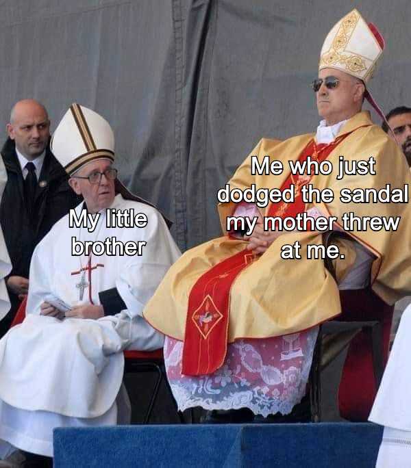 image of a priest sitting in a chair with a priest in the background