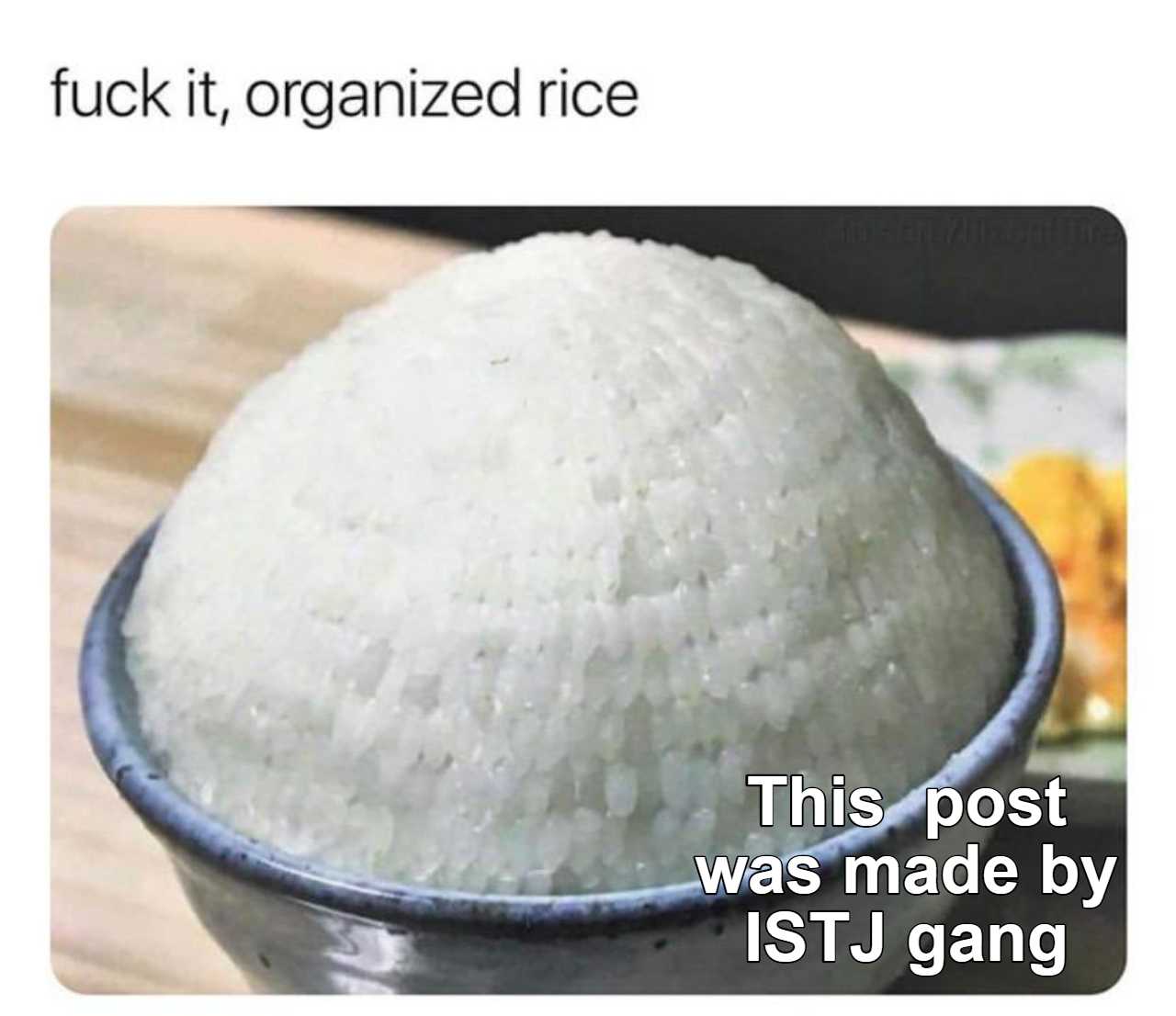 there is a bowl of rice that is sitting on a table