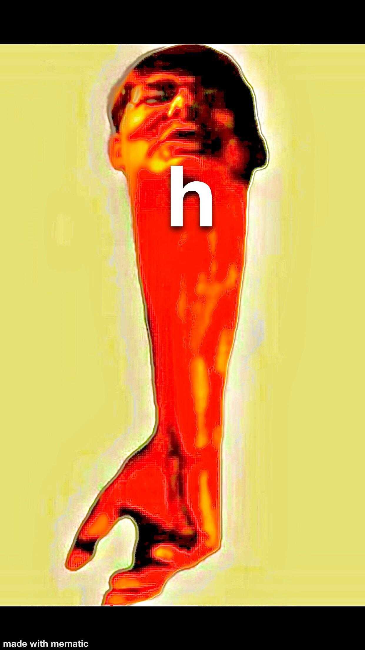 there is a red hot pepper with a white letter n on it