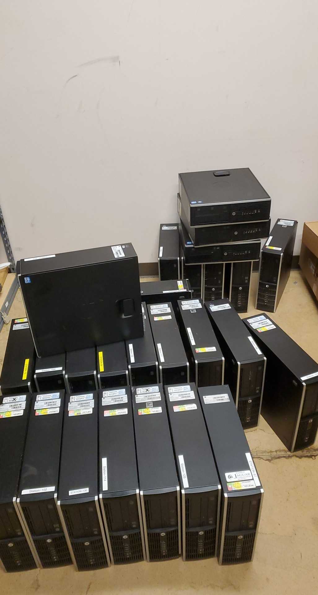 computer equipment sitting on a floor in a room