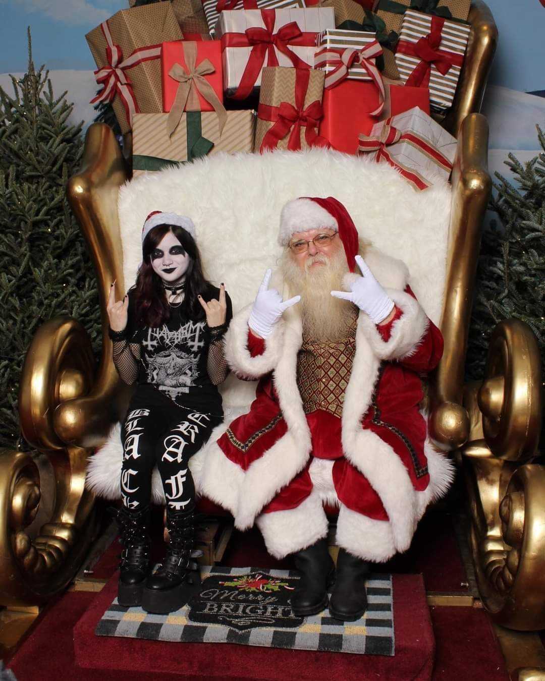 araffe dressed as santa claus and a woman dressed as a skeleton