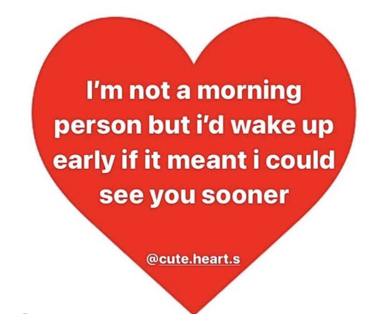 a red heart with a quote on it saying i ' m not a morning person but i wake up early