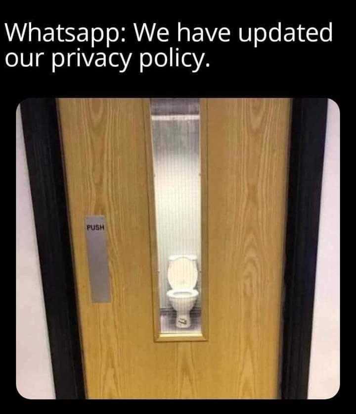 there is a picture of a toilet in a bathroom with a privacy policy sign