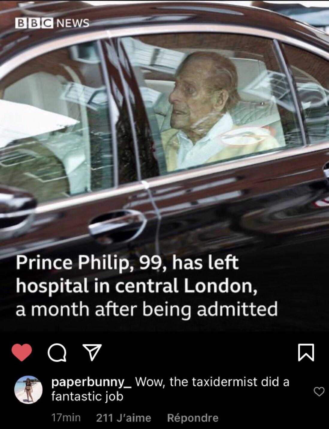 a close up of a car with a man in a suit in the passenger seat