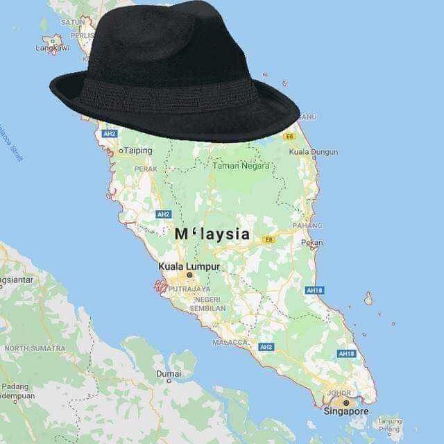 hat on a map of malaysia with a black hat