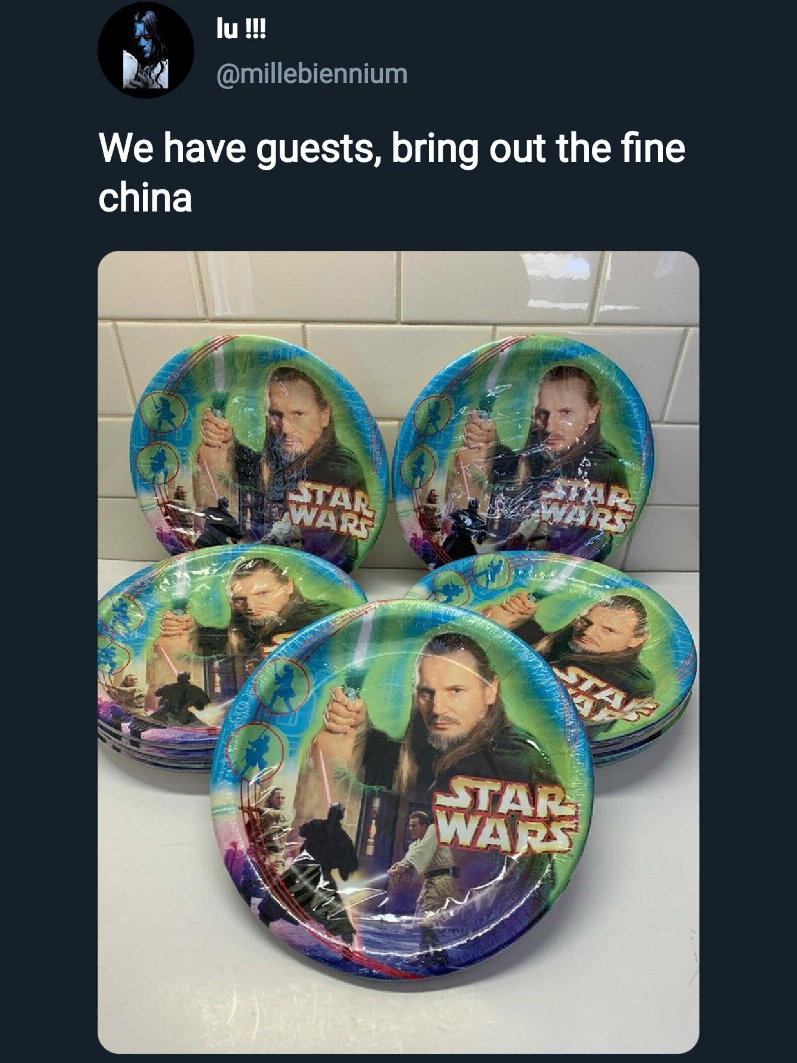 a close up of a group of plates with a star wars theme