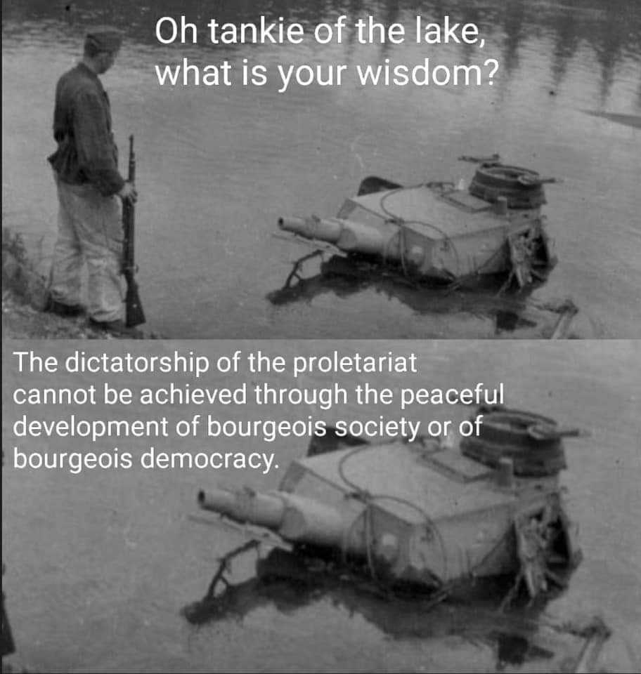 a black and white photo of a man standing next to a tank