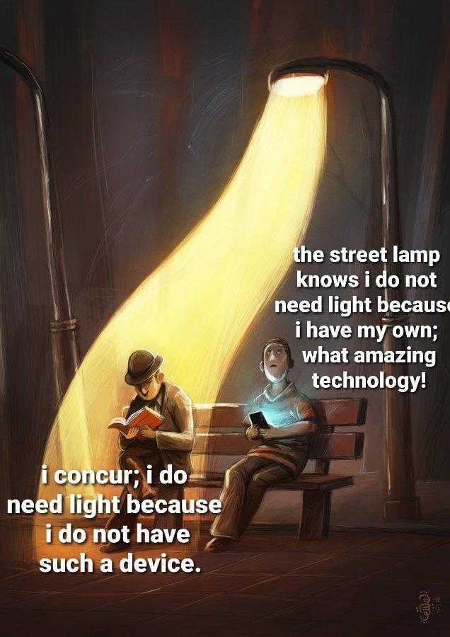 someone is reading a book in the dark with a light coming from the lamp