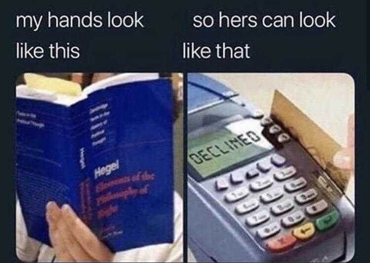 book with a calculator and a hand holding a book