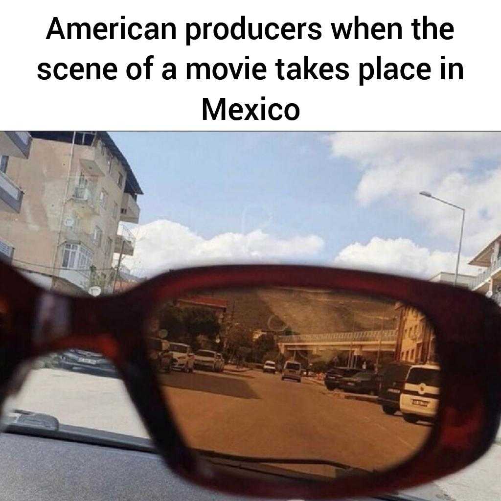 sunglasses with a reflection of a movie set in them