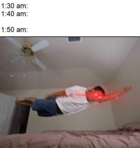 man in white shirt jumping on bed with red light