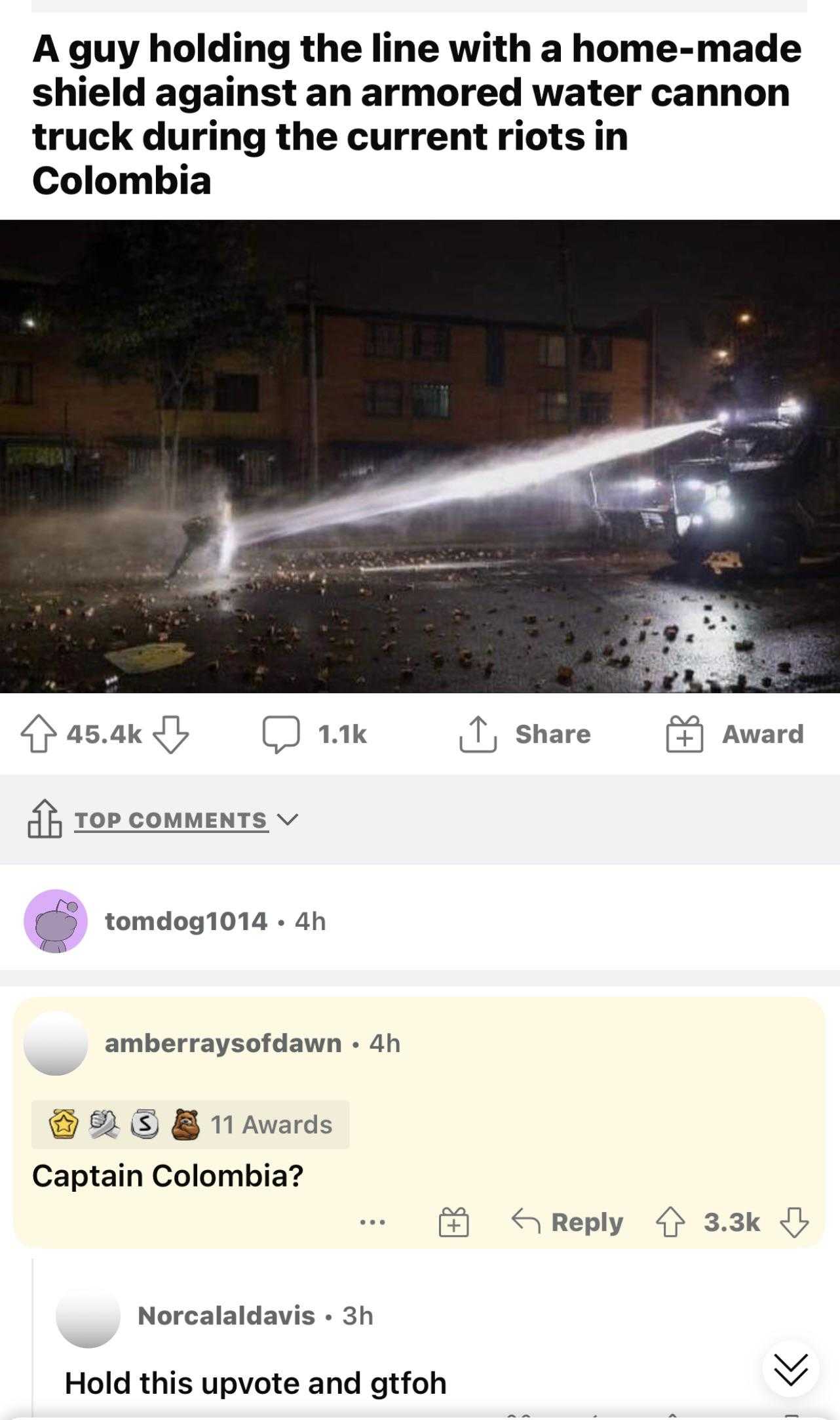 a screenshot of a fire hydrant spraying water at a building