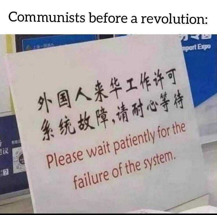 sign with chinese writing on it stating that the system is not going to be a failure