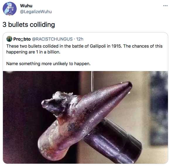 a close up of a metal object with a bullet on it