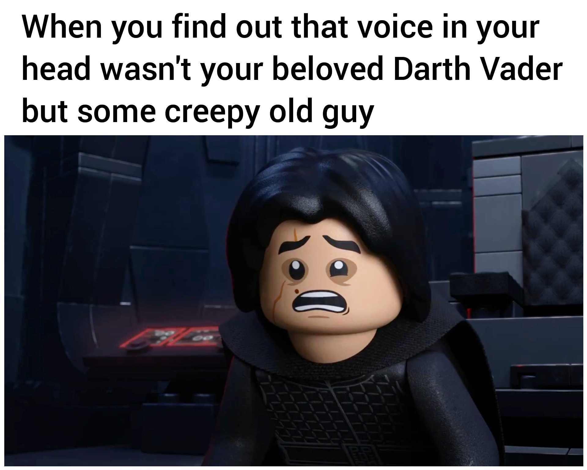 a close up of a lego figure with a caption of a man in a black outfit