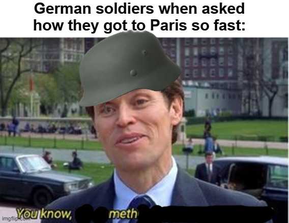 image of a man in a suit and tie wearing a german soldier ' s hat