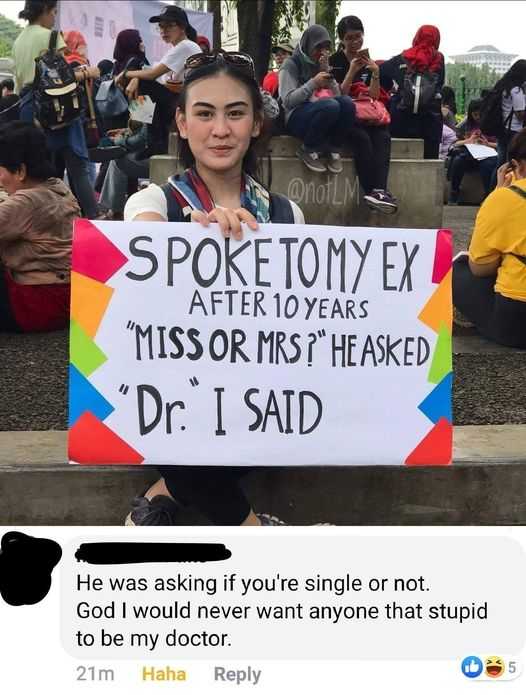 woman holding a sign that reads spoke to my ex after 10 years miss or mrs he asked dr i said