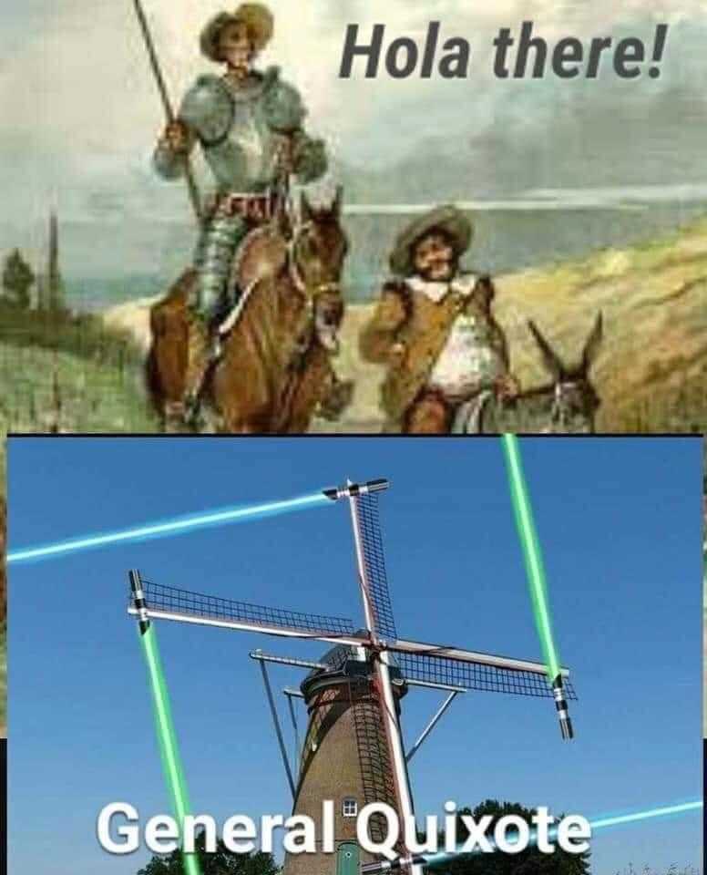 a picture taken from a video of a man riding a horse next to a windmill