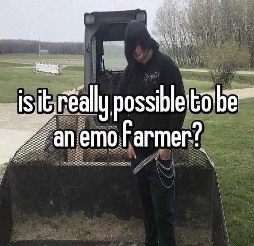 man standing in front of a tractor with a knife in his hand