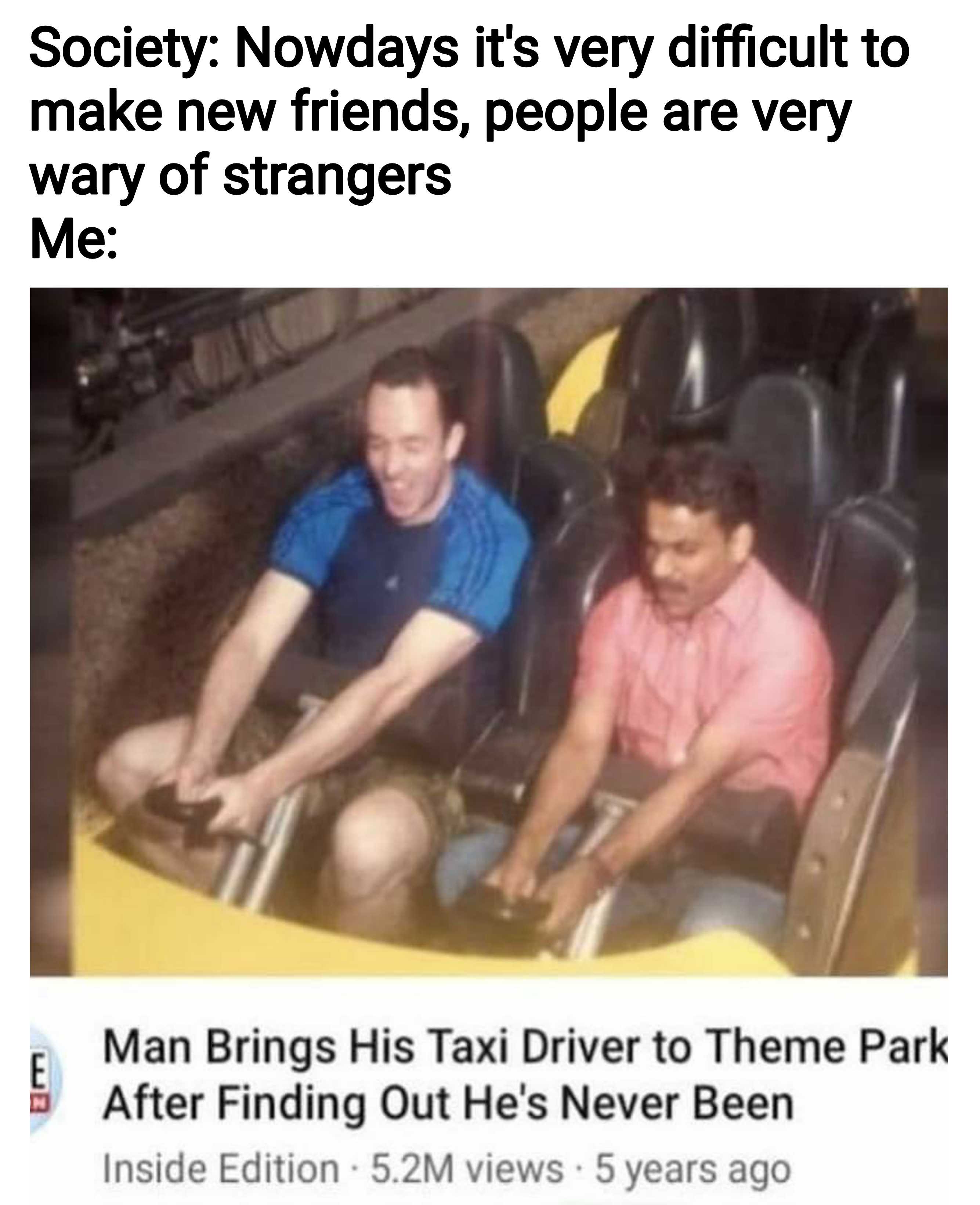 there are two men sitting on a roller coaster in a park