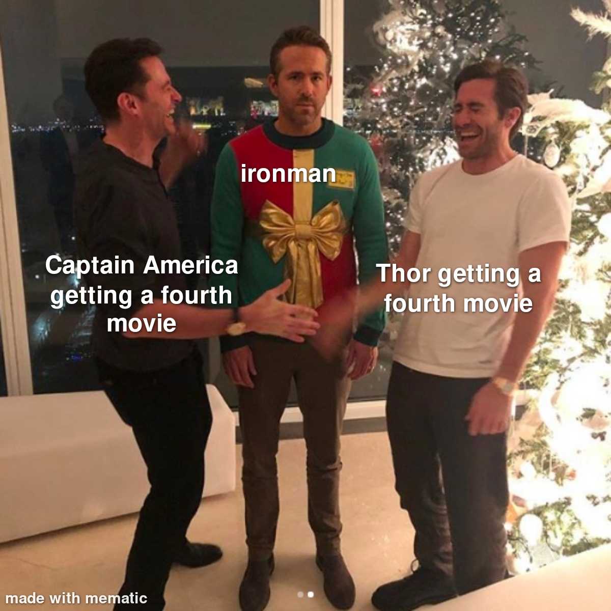 three men standing in front of a christmas tree with a present