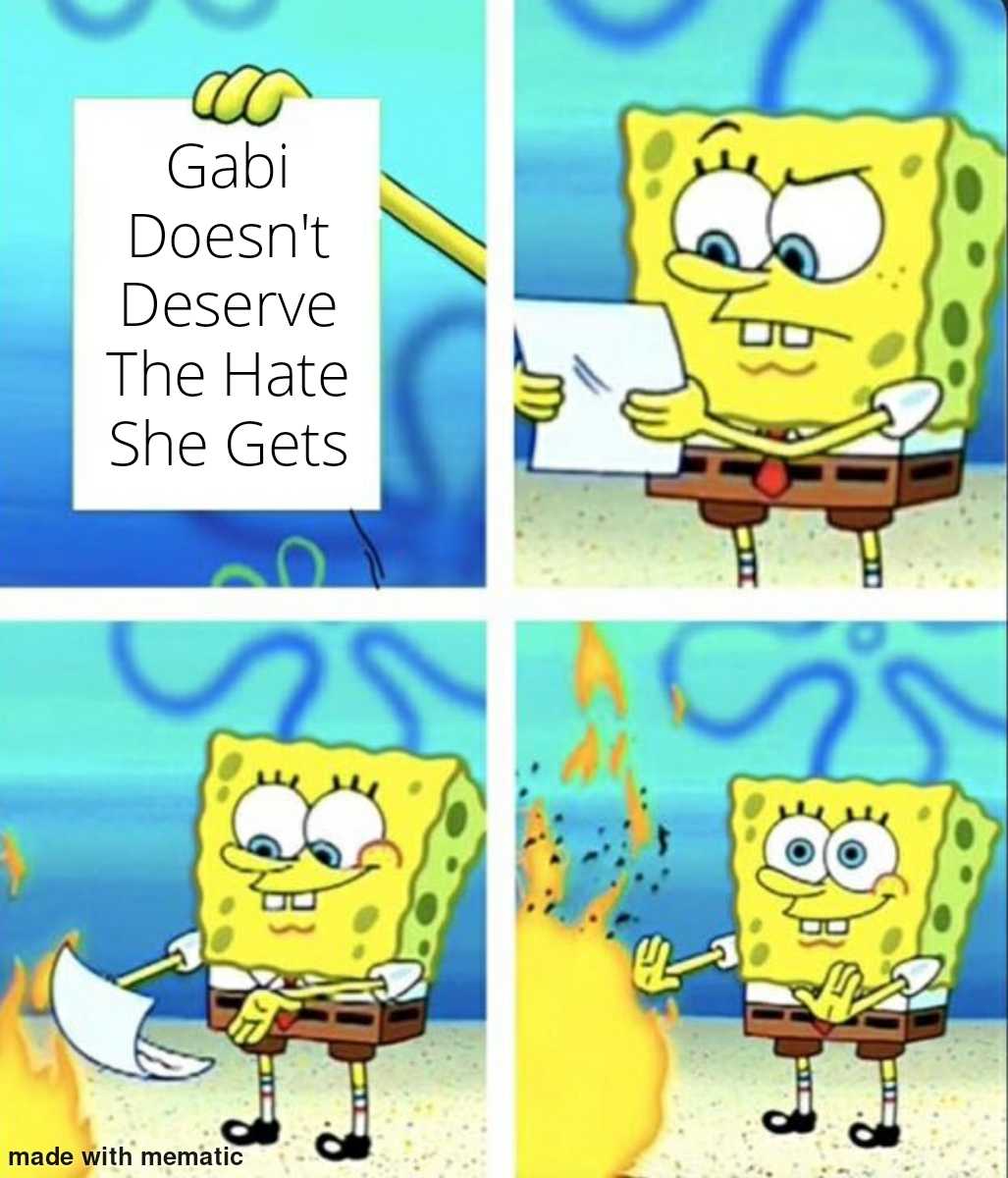 cartoon of sponge sponge with a sign that says, gabi doesn ' t deserve the hate she gets