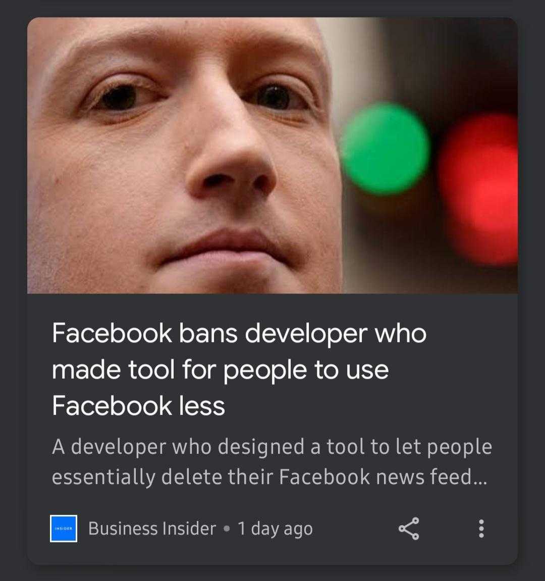 a close up of a person with a facebook ad on their phone