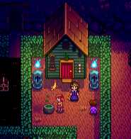 a screenshot of a house with a small kitchen and a door