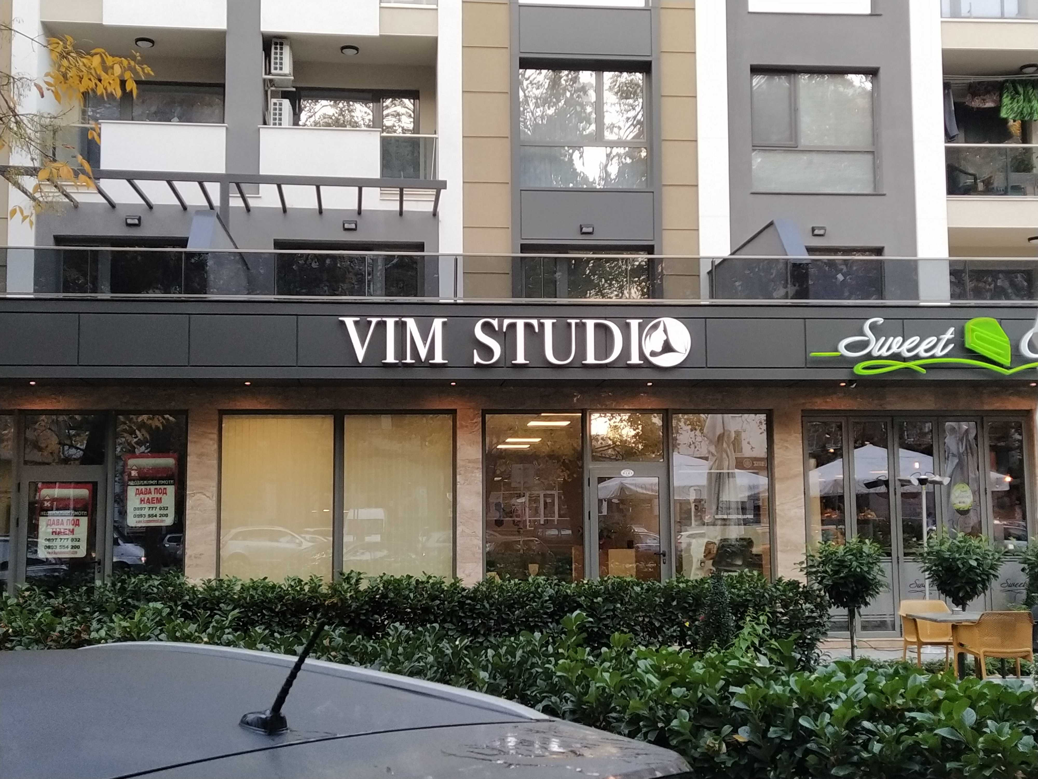 view of a building with a sign that says vine studio