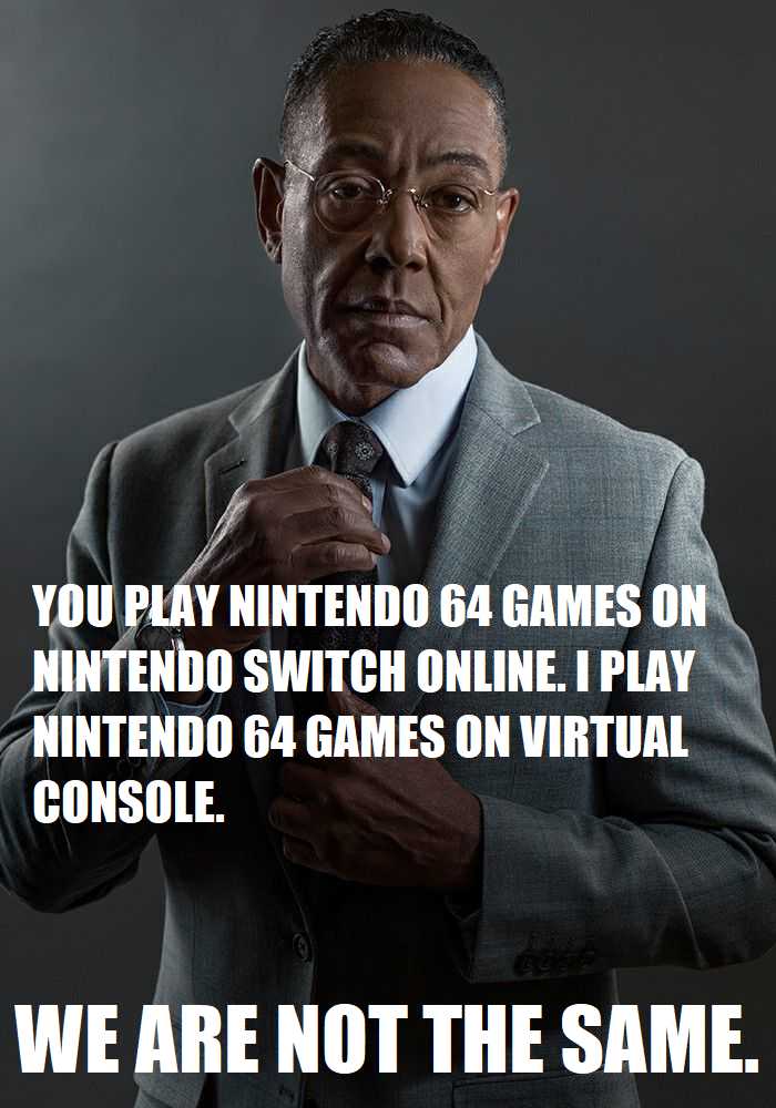 there is a man in a suit and tie holding a nintendo wii controller