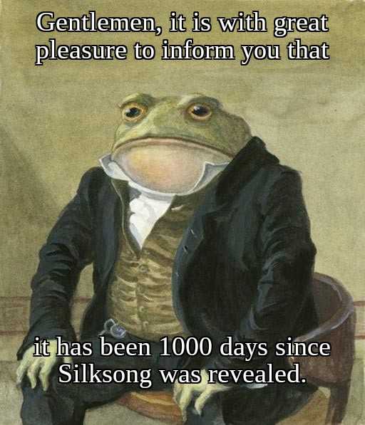 frog in a suit sitting on a chair with a caption that reads gentlemen, it is