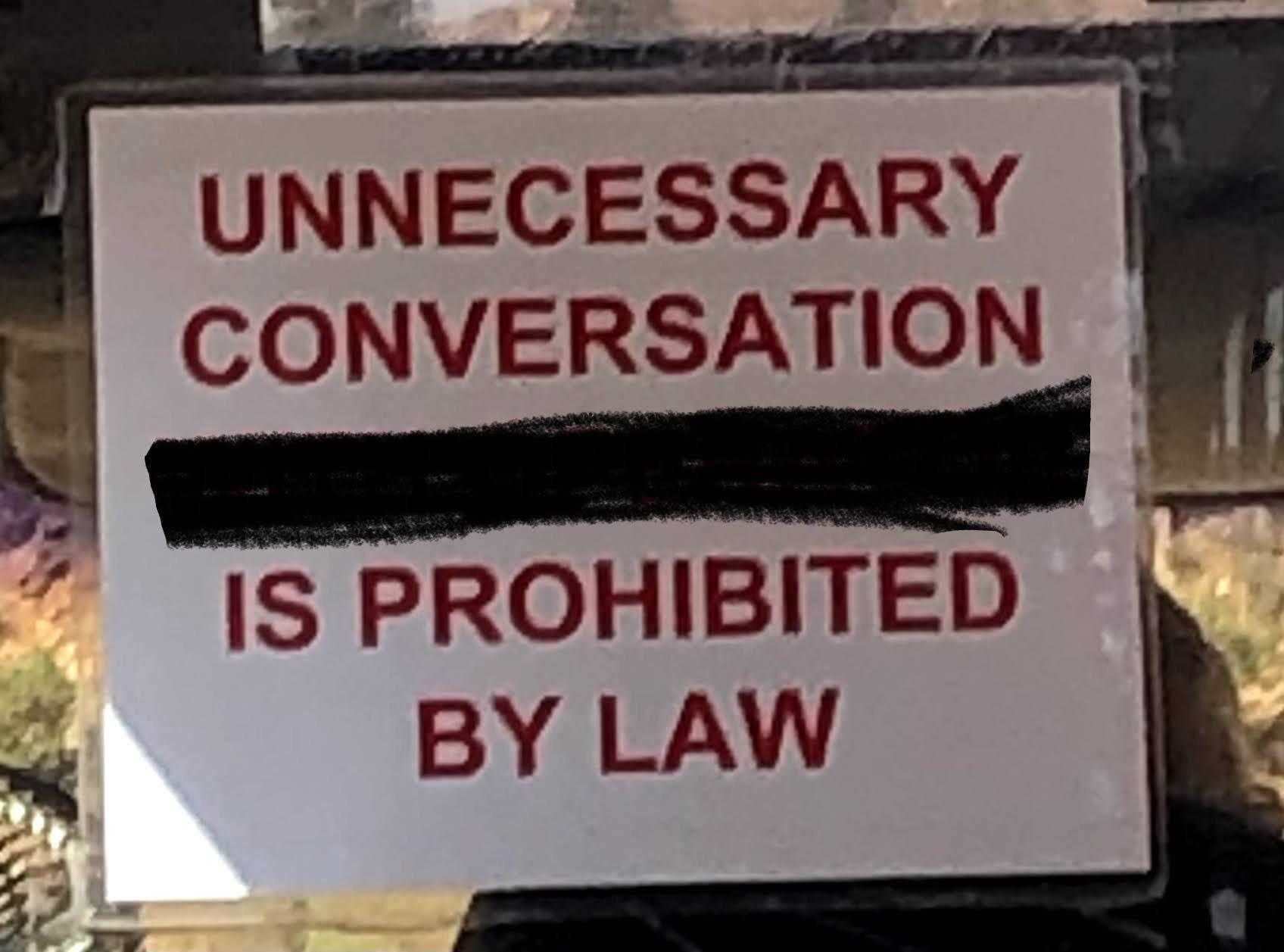 there is a sign that says unnecessary conversation is prohibited by law