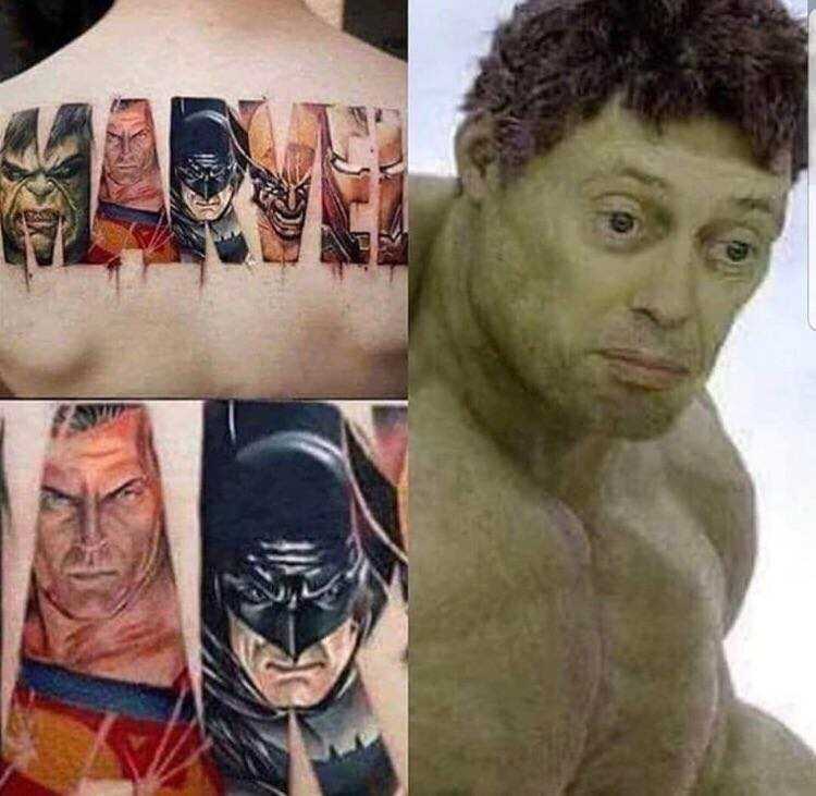 a close up of a man with a tattoo of different superheros