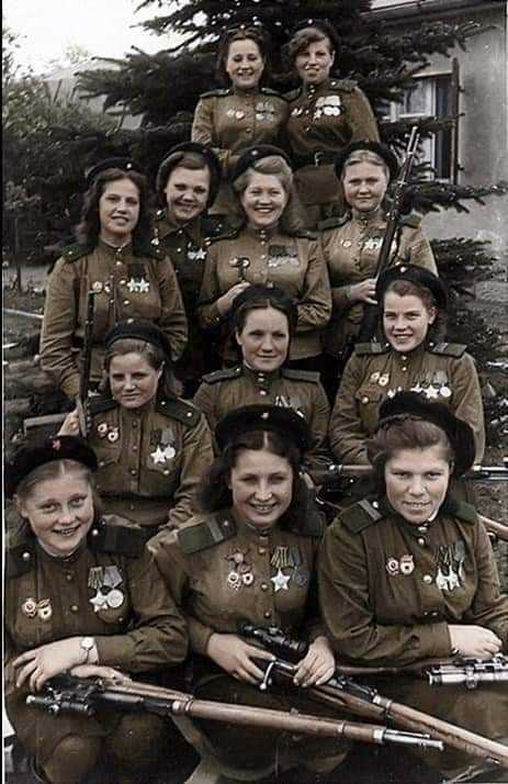 picture of a group of women in uniform posing for a picture