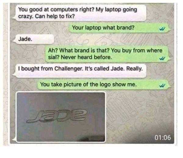 a close up of a text message with a picture of a laptop