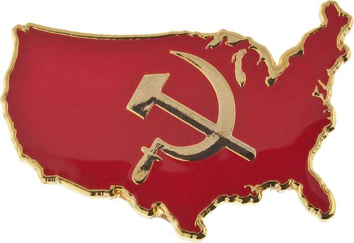 a close up of a red and gold pin with a hammer and sickle