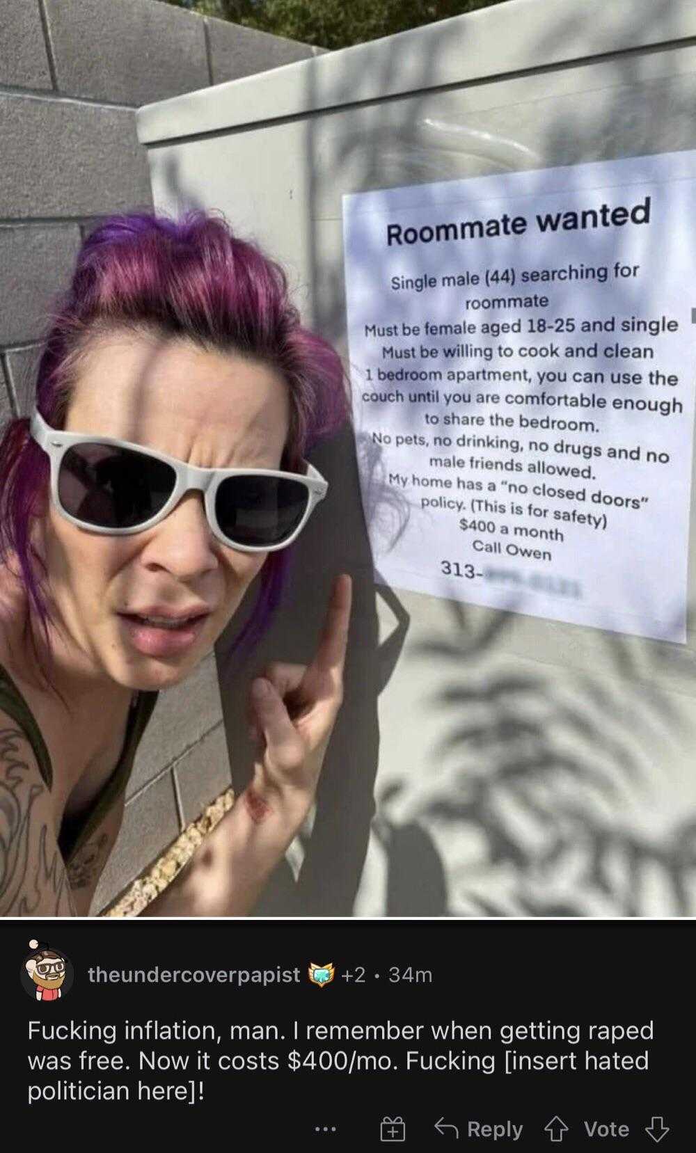 woman with purple hair and sunglasses posing in front of a sign