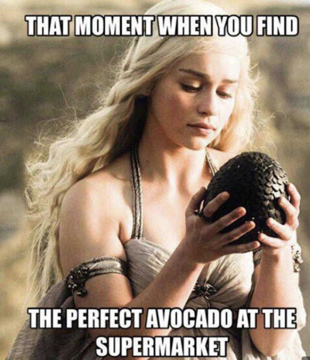 a woman holding a black egg in her hands with a caption that says that moment when you find the