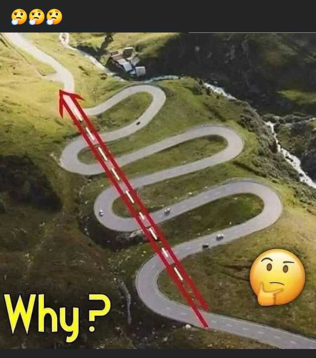 there is a picture of a road with a red arrow pointing up