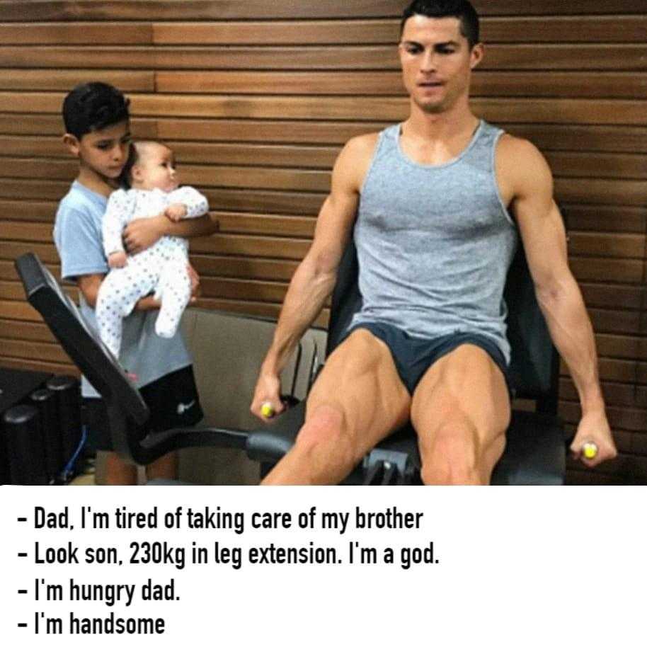 there is a man sitting on a bench with a baby