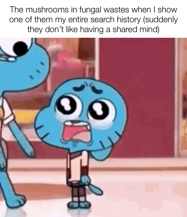 cartoon of a blue gummy with a surprised expression and a caption of a man with a tie