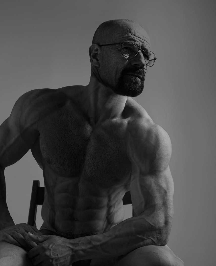 man with glasses and beard sitting on a chair