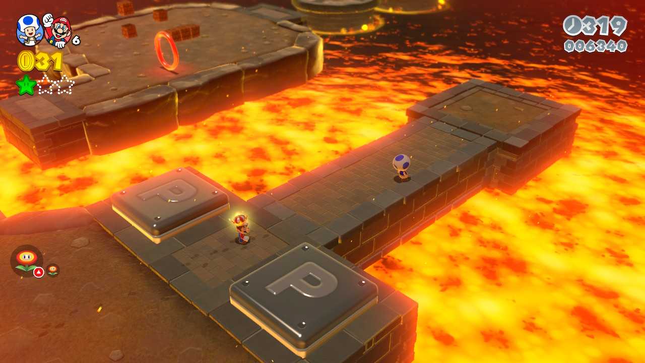 a close up of a nintendo wii game with a fire in the background