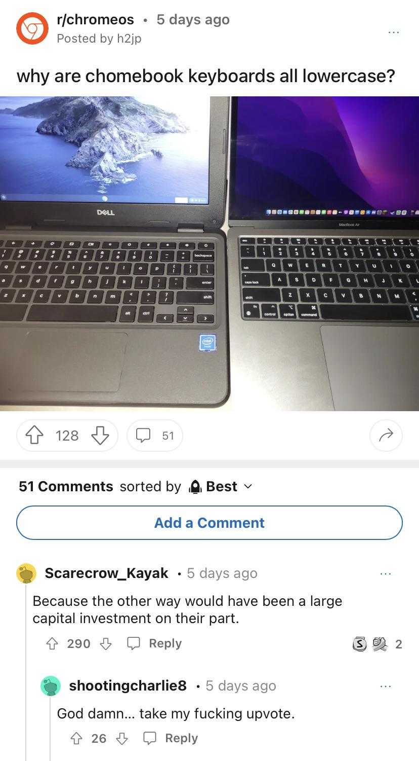 two laptops are sitting side by side on a table