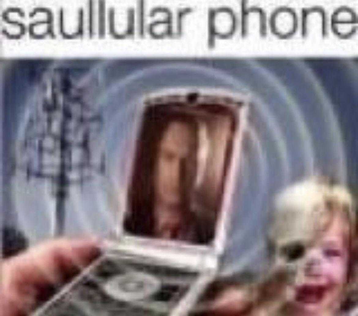 there is a woman holding a cell phone with a picture of a woman on it