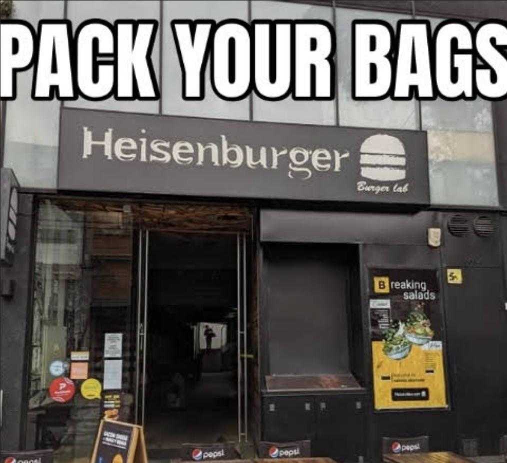 picture of a restaurant with a sign that says pack your bags