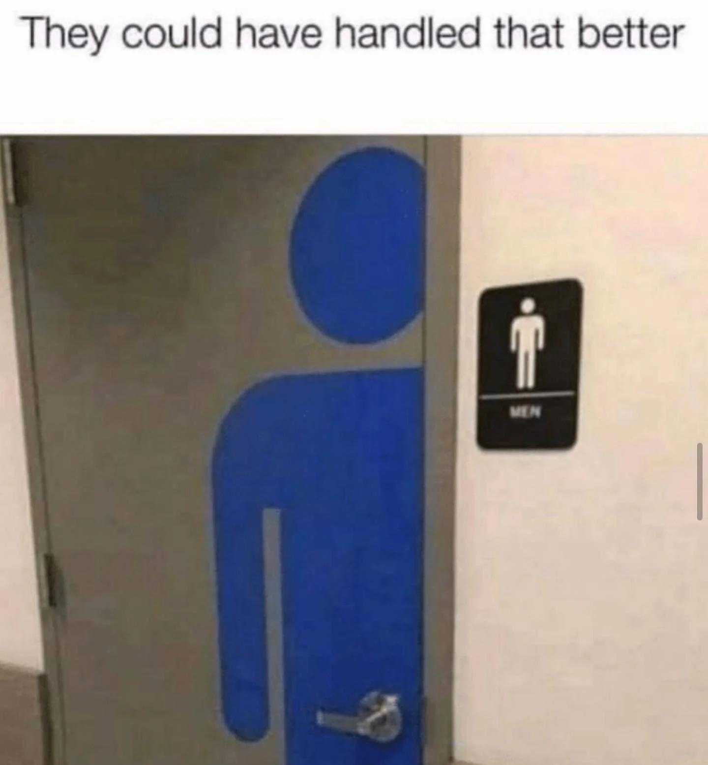 there is a blue sign on the door of a restroom